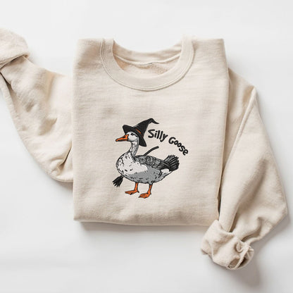 Teesdily | Halloween Goose Witch Embroidered Shirt, Silly Goose Embroidery Sweatshirt, Silly Goose On The Loose Shirt, Funny Goose Halloween Gifts