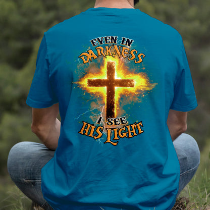 Teesdily | Even In The Darkness I See His Light Shirt, Jesus Christ Cross Sweatshirt Hoodie, Christian Faith Religious Gift