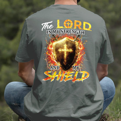 Teesdily | The Lord Is My Strength And My Shield Shirt, Jesus Christian Cross Sweatshirt, Faith God Hoodie Mug, Religious Gift Men