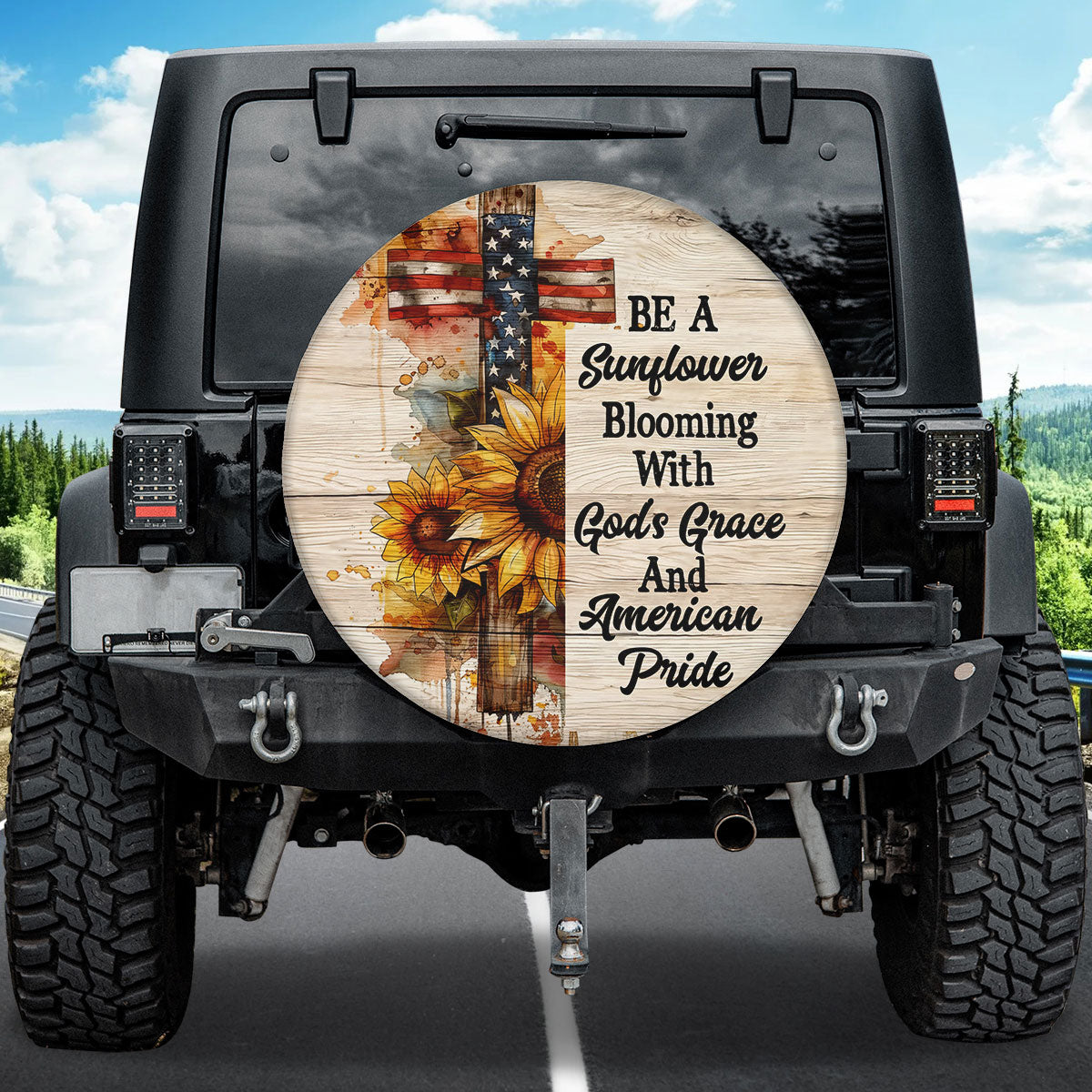 Teesdily | Jesus Cross Sunflower Spare Tire Cover, Blooming With God's Grace And American Pride, God Usa Flag Independence Spare Tire Cover 27"-34"