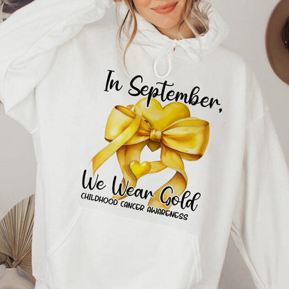 Teesdily | In September We Wear Gold Shirt, Cancer Coquette Bow Gold Sweatshirt, Childhood Cancer Awareness Hoodie Mug Survivor