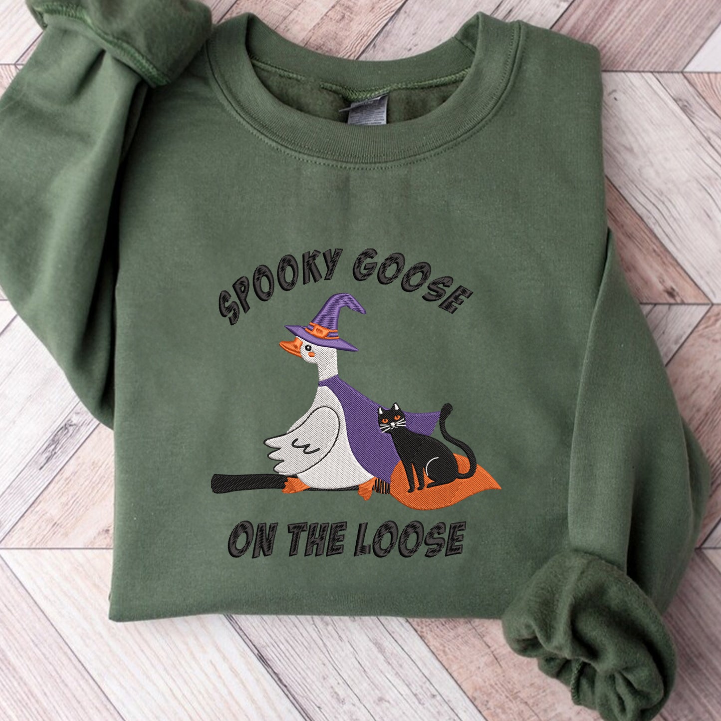 Teesdily | Halloween Witch Goose Embroidered Shirt, Spooky Goose On The Loose Sweatshirt Embroidery, Funny Goose And Black Cat Halloween Shirt Gift