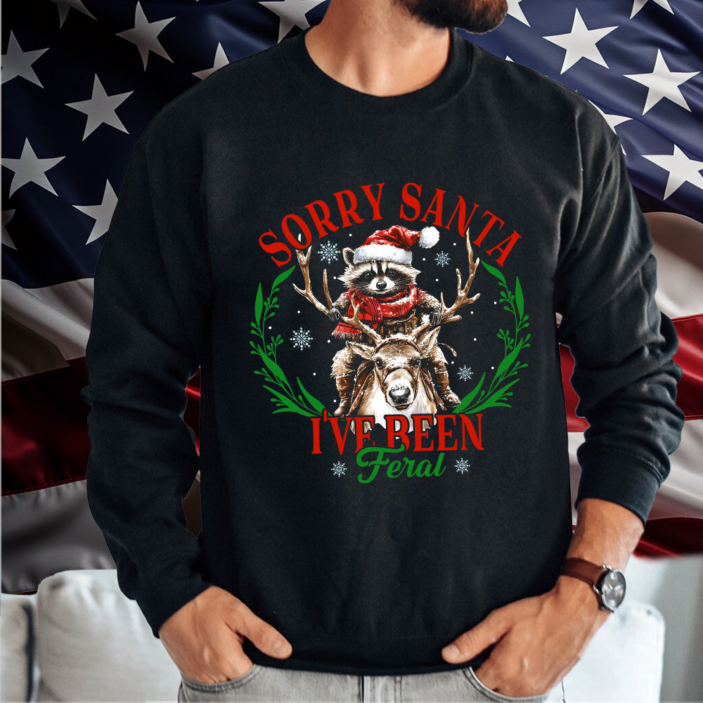 Teesdily | Sorry Santa I've Been Feral Shirt, Christmas Raccoon Shirt, Raccoon Santa Reindeer Sweatshirt Hoodie Mug, Family Gift