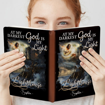 Teesdily | Personalized Jesus Lighthouse Storm Notebook, At My Darkest God Is My Light Notebook, God Faith Religious Gift, Christian Leather Journal