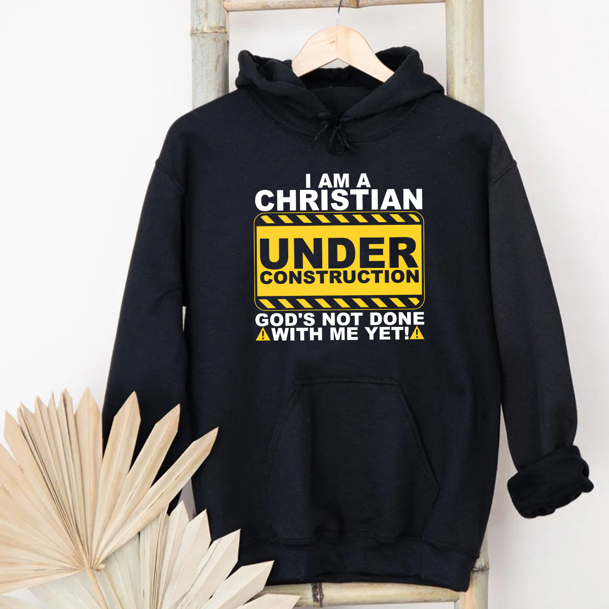 Teesdily | Christian Under Construction Graphic Shirt, God's Not Done With Me Yet Sweatshirt Hoodie Mug, Christian Gift Streetwear Clothing