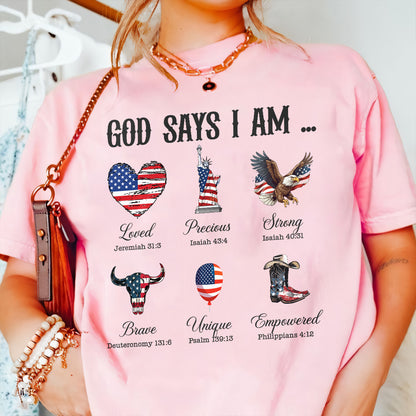 Teesdily | God Says I Am Shirt, American Flag Cowboy Sweatshirt, Eagle Heart Statue of Liberty Mug, Jesus Christ Mug Gifts