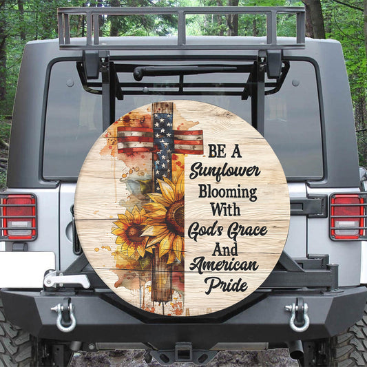 Teesdily | Jesus Cross Sunflower Spare Tire Cover, Blooming With God's Grace And American Pride, God Usa Flag Independence Spare Tire Cover 27"-34"