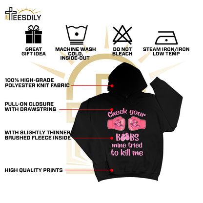 Teesdily | Check Your Boobs Mine Tries To Kill Me Shirt, Breast Cancer Sweatshirt, Cancer Awareness Pink Ribbon Hoodie Mug, Cancer Survivor Gifts