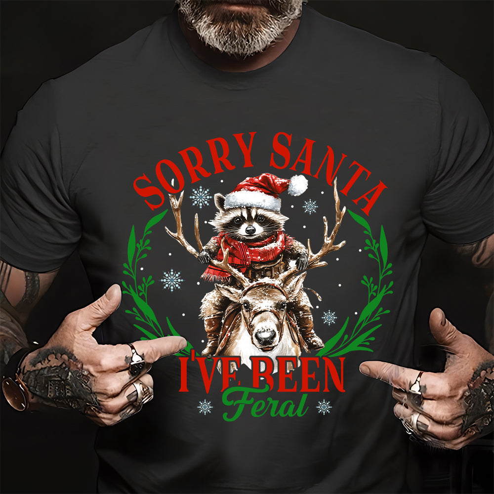 Teesdily | Sorry Santa I've Been Feral Shirt, Christmas Raccoon Shirt, Raccoon Santa Reindeer Sweatshirt Hoodie Mug, Family Gift