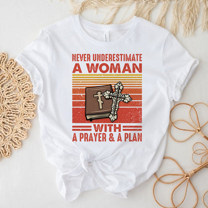 Teesdily | Jesus Christian Bible Book Retro Tshirt Never Underestimate A Woman With A Prayer And A Plan Sweatshirt Hoodie Mug Christian Gift Ideas