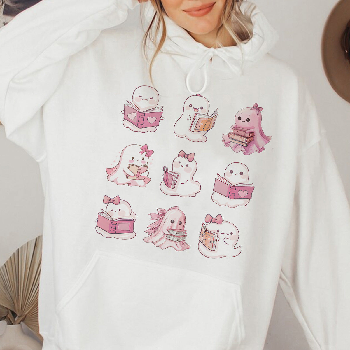 Teesdily | Halloween Pink Ghost Shirt, Halloween Spooky Ghost Reading Book Sweatshirt Hoodie Mug, Ghost Bow Tee, Book Lovers Gift, Halloween Gifts