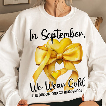 Teesdily | In September We Wear Gold Shirt, Cancer Coquette Bow Gold Sweatshirt, Childhood Cancer Awareness Hoodie Mug Survivor