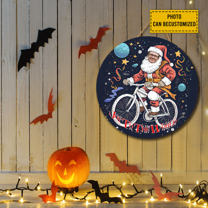 Teesdily | Customized Photo Santa Claus Cycling Wood Sign Joy To The World Christmas Front Door Sign Funny Custom Face Wood Sign Xmas Decor