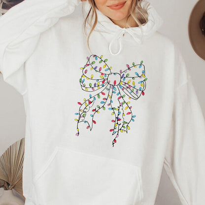 Teesdily | Christmas Light Bow Shirt, Christmas Coquette Bow Sweatshirt, Merry Xmas Coquette Bow Hoodie, Holiday Season Mug Gifts