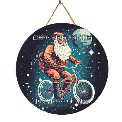 Teesdily | Customized Santa Claus Cycling Wood Sign Christmas Isn'T Just A Day It's A Frame Of Mind Front Door Sign Funny Custom Xmas Decor