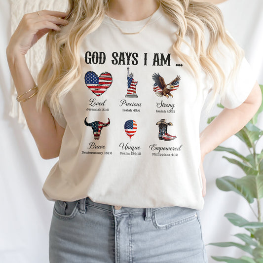 Teesdily | God Says I Am Shirt, American Flag Cowboy Sweatshirt, Eagle Heart Statue of Liberty Mug, Jesus Christ Mug Gifts