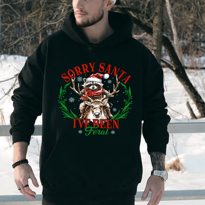 Teesdily | Sorry Santa I've Been Feral Shirt, Christmas Raccoon Shirt, Raccoon Santa Reindeer Sweatshirt Hoodie Mug, Family Gift