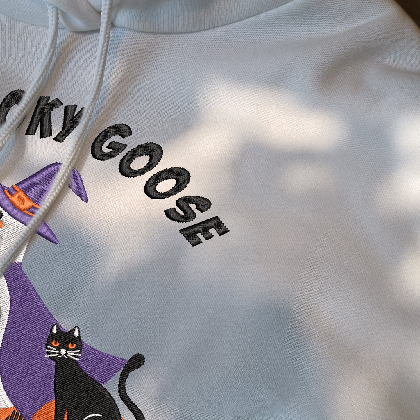 Teesdily | Halloween Witch Goose Embroidered Shirt, Spooky Goose On The Loose Sweatshirt Embroidery, Funny Goose And Black Cat Halloween Shirt Gift