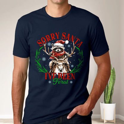 Teesdily | Sorry Santa I've Been Feral Shirt, Christmas Raccoon Shirt, Raccoon Santa Reindeer Sweatshirt Hoodie Mug, Family Gift